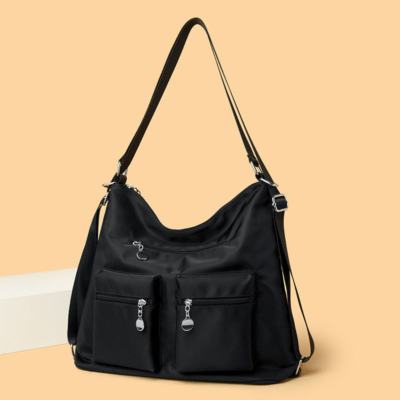 Geräumige Mehrfachtaschen-Schultertasche Karnz