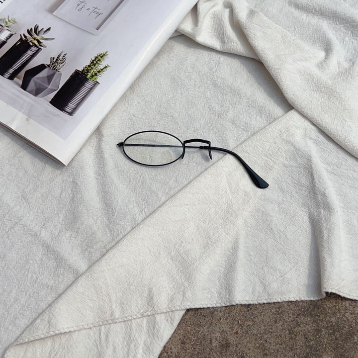 Retro-inspirierte ovale Rahmenbrille Karnz