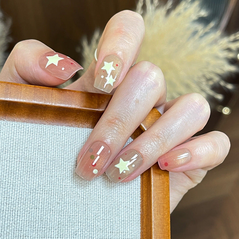 Künstlerisches Press-On Nail Set mit Stern- und Punktdesign Karnz