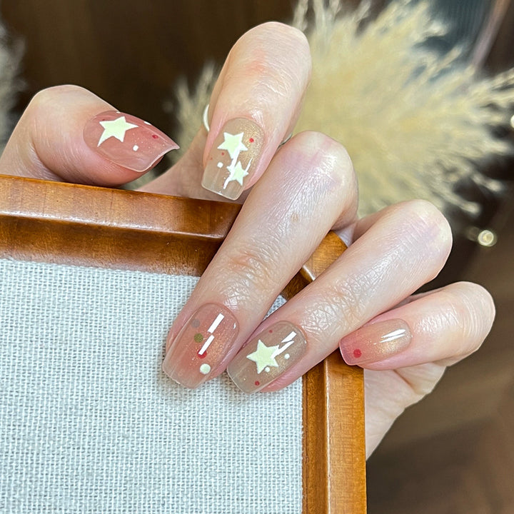 Künstlerisches Press-On Nail Set mit Stern- und Punktdesign Karnz