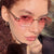 Damen elegante ovale Sonnenbrille mit goldenen Akzenten Karnz