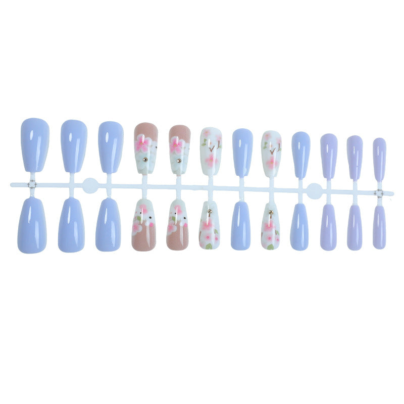 Elegantes Press-On Nagelset mit floralen Akzenten Karnz 1788496046