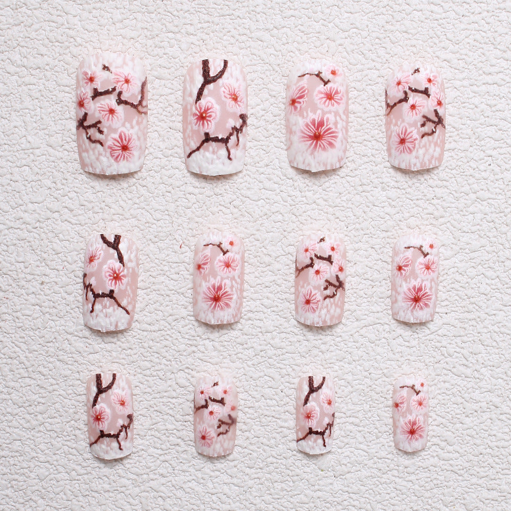 Blumenverzierte Press-On Nagelkunst Karnz