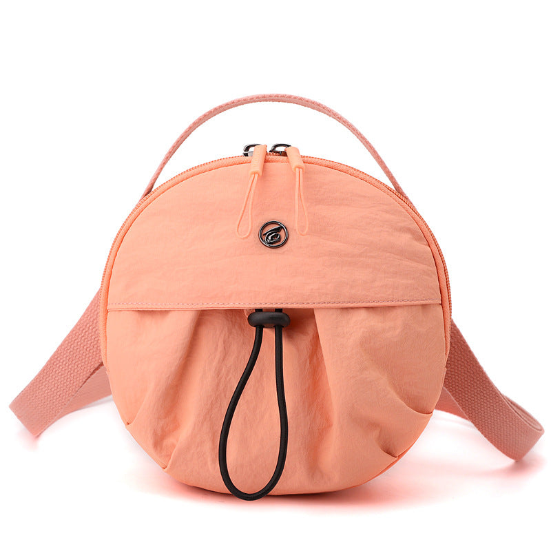 Runde Crossbody-Tasche Karnz