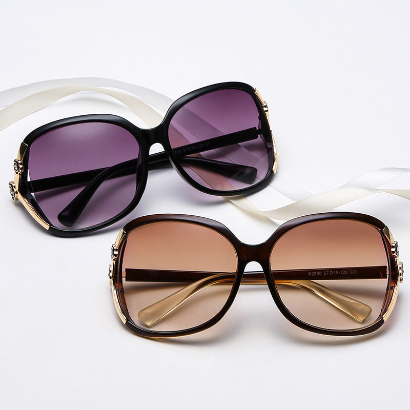 Damen elegante oversized Sonnenbrille mit goldenen Akzenten Karnz