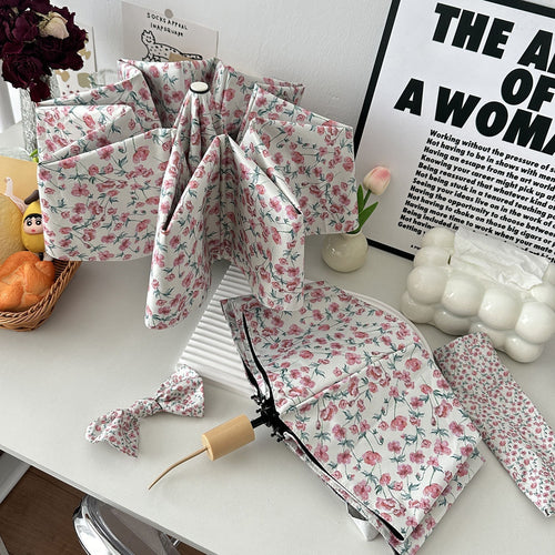 Damen Faltregenschirm mit floralem Design und praktischem Aufbewahrungssystem Karnz
