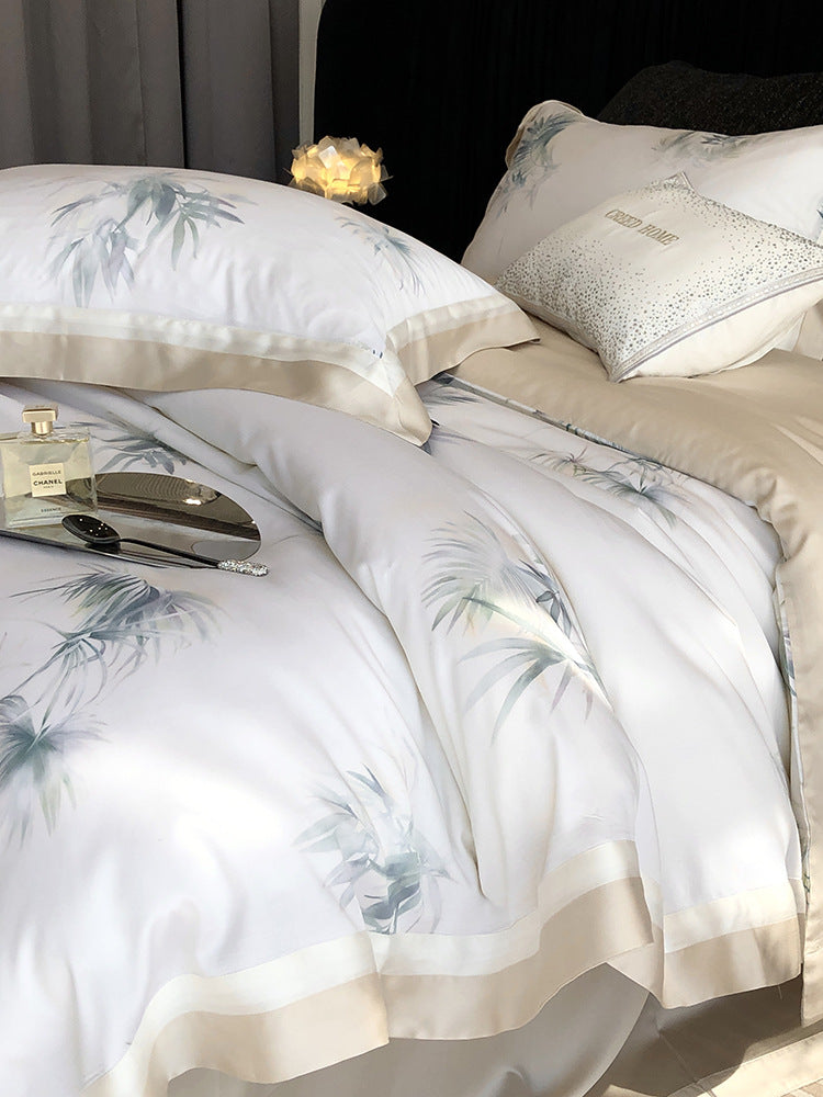 Luxuriöses Baumwollsatin-Bettwäsche-Set mit zartem Blattprint, kontrastiertem Saum und feiner Paspel
