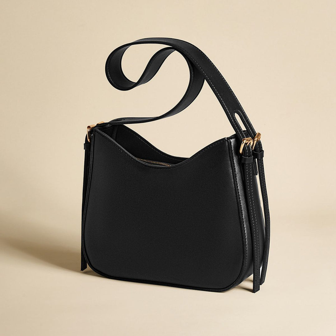 Schlanke moderne tragbare Schultertasche Karnz