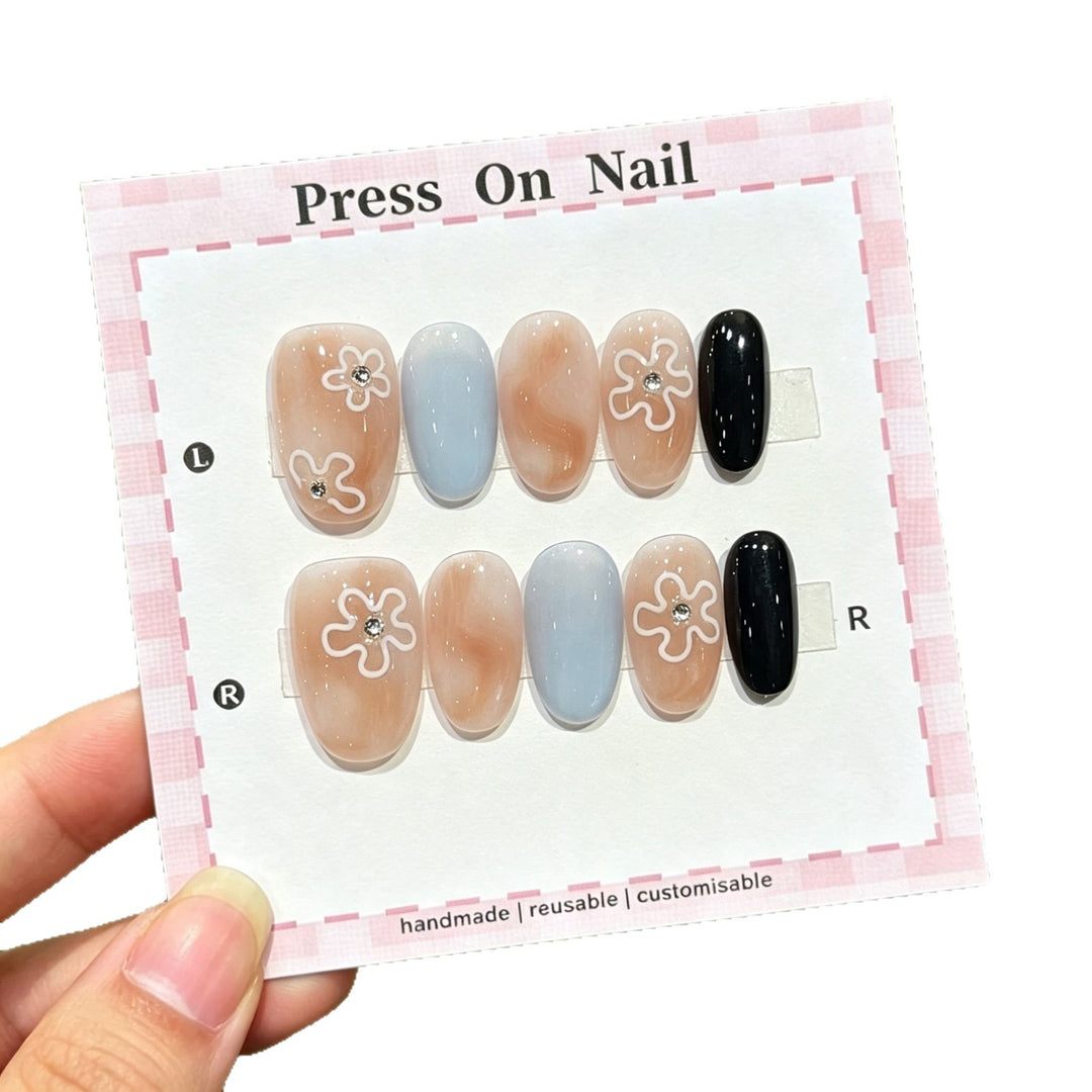 Künstlerisches Press-On Nagelset mit floralen Akzenten  1791773601
