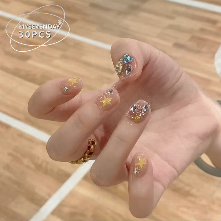 Künstlerisches Press-On Nagelset mit Edelsteinen und Sternelementen Karnz