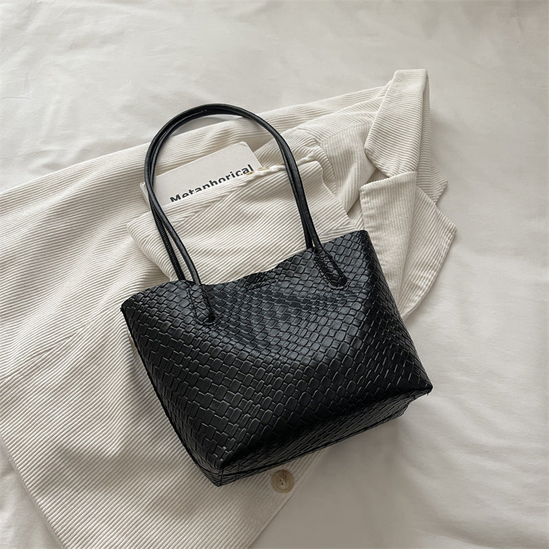 Gewebte strukturierte Handtasche