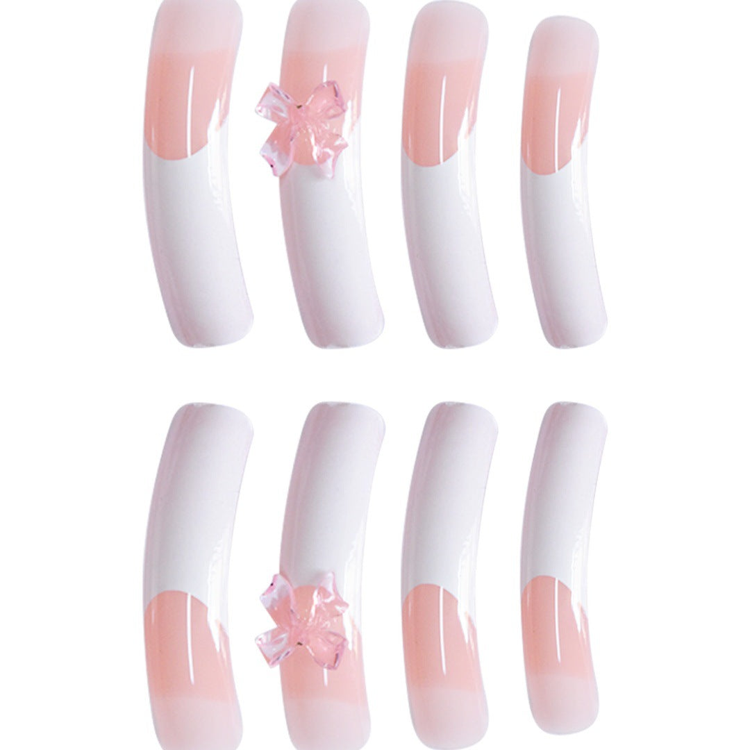 Stylische Acryl Press-On Nagelverlängerungen mit dekorativem Bogen Karnz