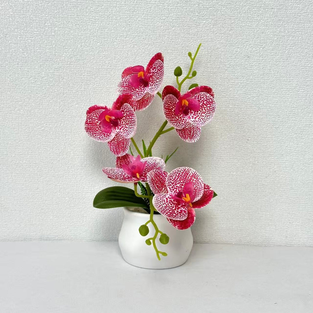 Elegante künstliche Orchideenpflanzenarrangement für die Wohnkultur