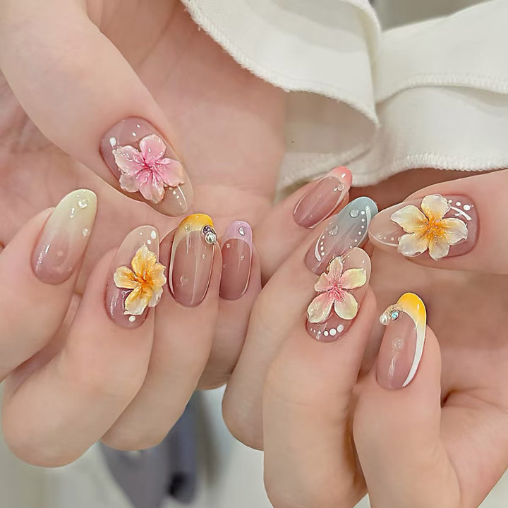 Künstlerisches Press-On-Nagelset mit floralen und Ombre-Designs Karnz