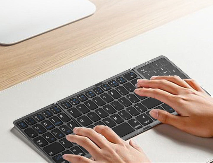 Kompakte Bluetooth-Tastatur mit Ziffernblock Karnz
