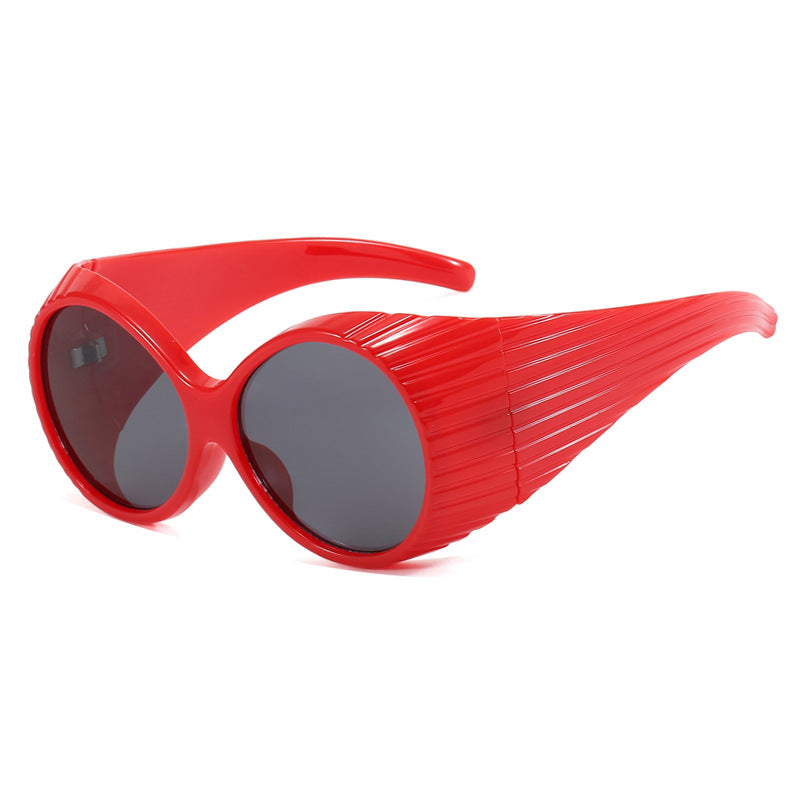 Damen extravagante Sonnenbrille mit geschwungenem Rahmen Karnz