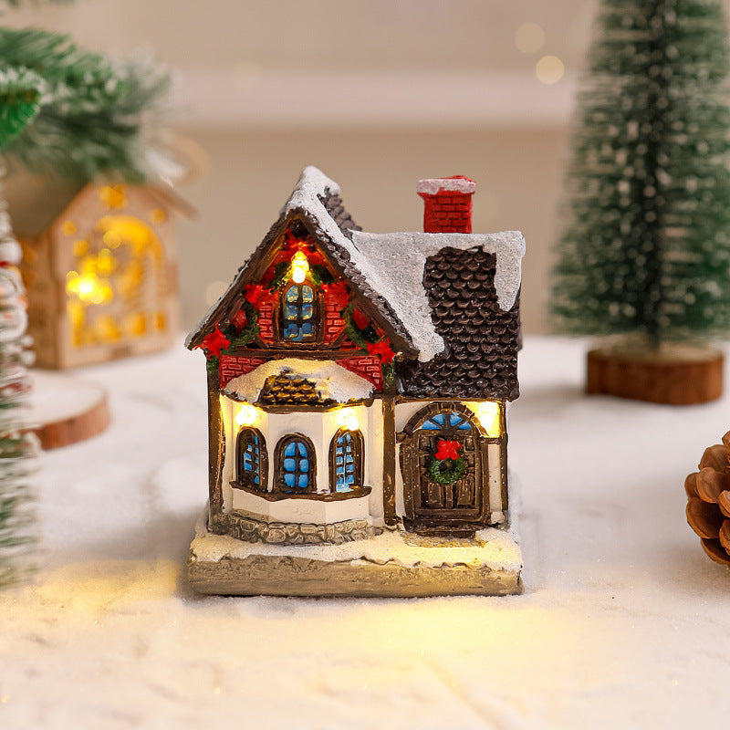 Dekoratives Weihnachtsdorf mit Lichtern Karnz