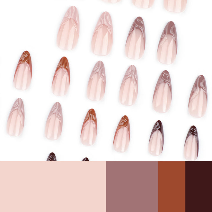 Kunstvolle Stiletto-Nägel mit elegantem Farbverlauf und Glitzerakzenten Karnz