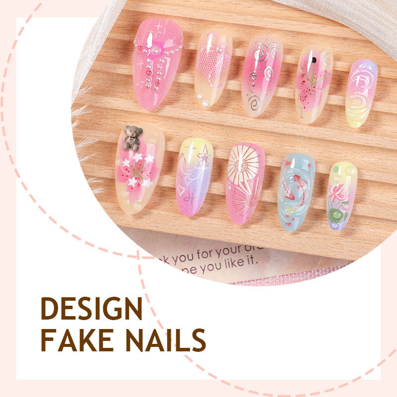 Kunstnagelset mit bunten Designs und dekorativen Verzierungen Karnz