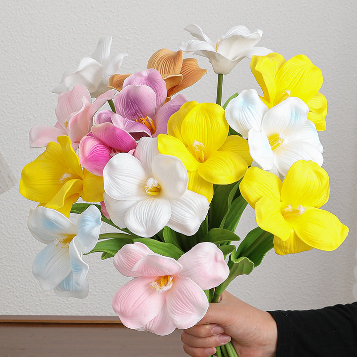 Künstlicher Orchideenblütenzweig mit realistischen Details Karnz