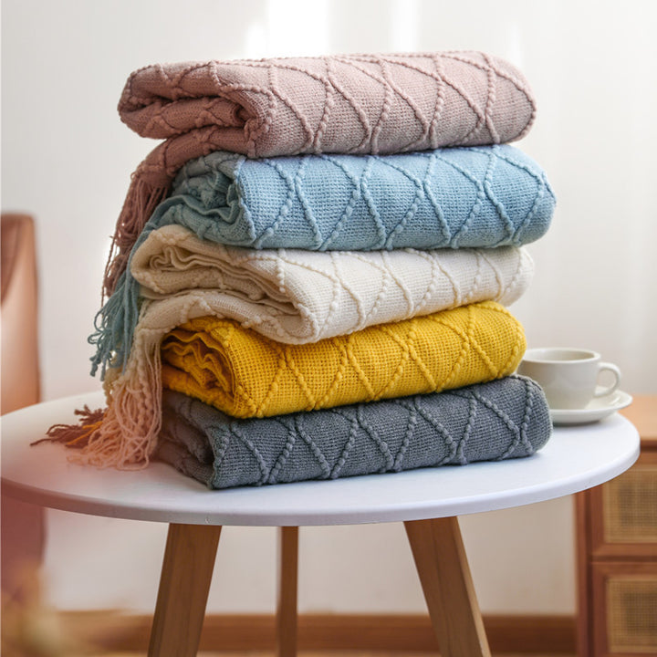 Gemütliche strukturierte gestrickte Wurfdecke