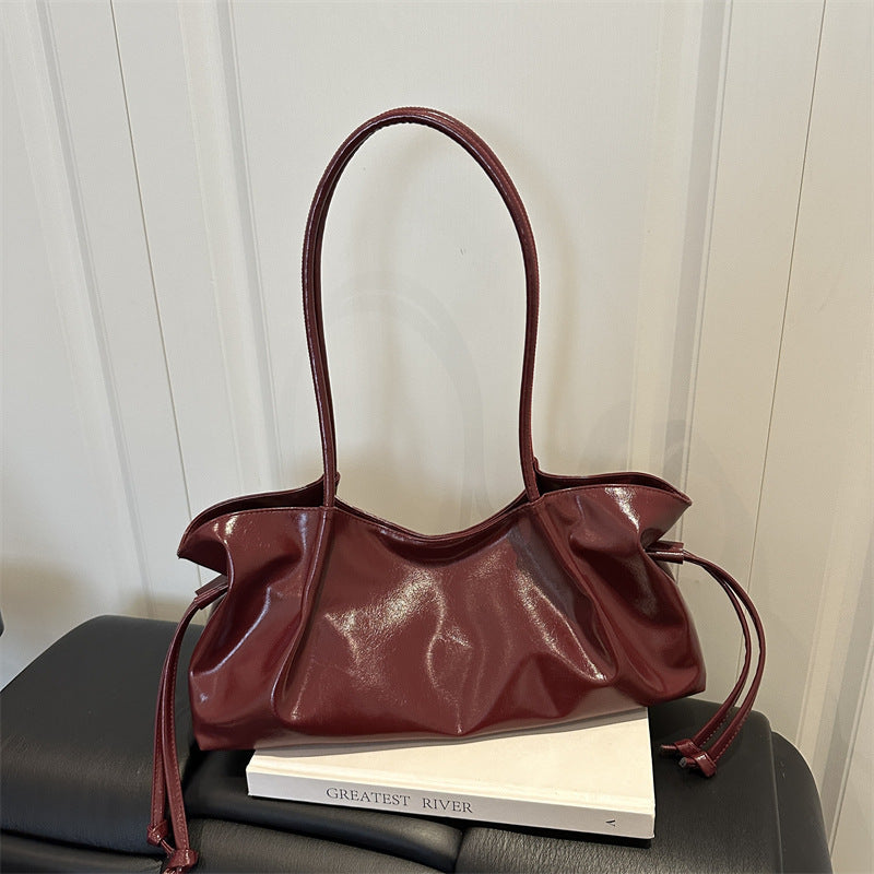 Glänzende Hobo-Handtasche
