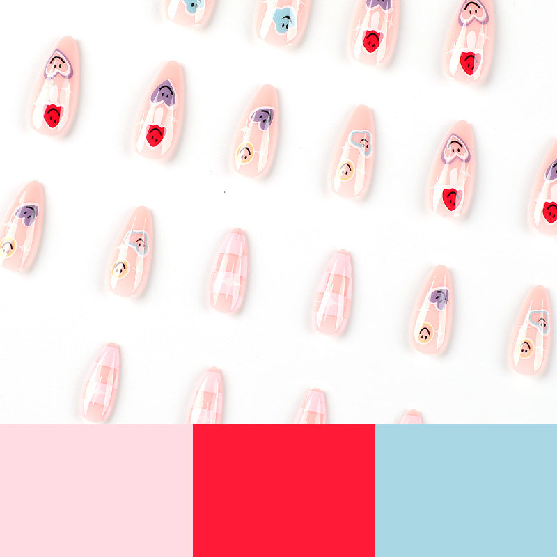 Kreative Nagelkunst mit verspielten Emoji-Motiven Karnz