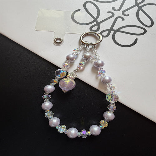 Elegante Perlen-Schlüsselanhänger mit Charm Karnz