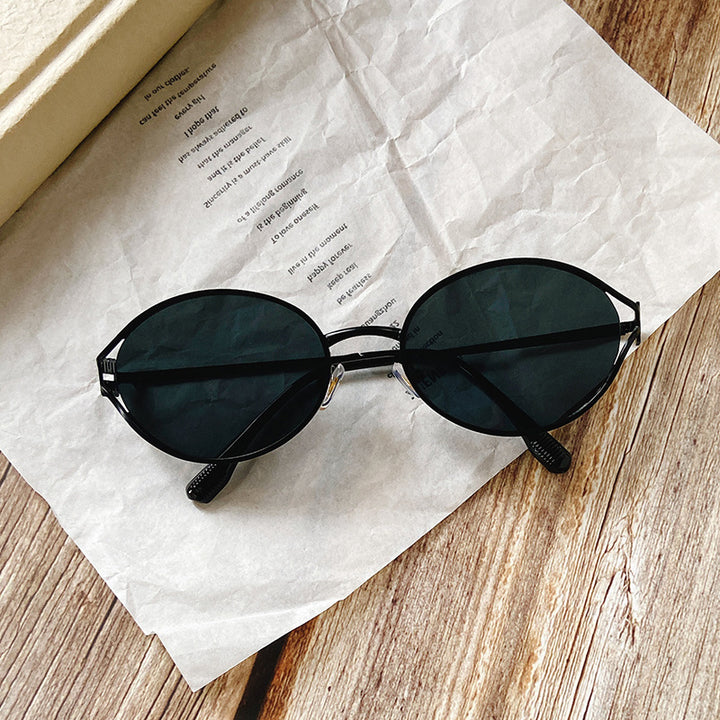 Runde Sonnenbrille mit Goldenen Akzenten Karnz