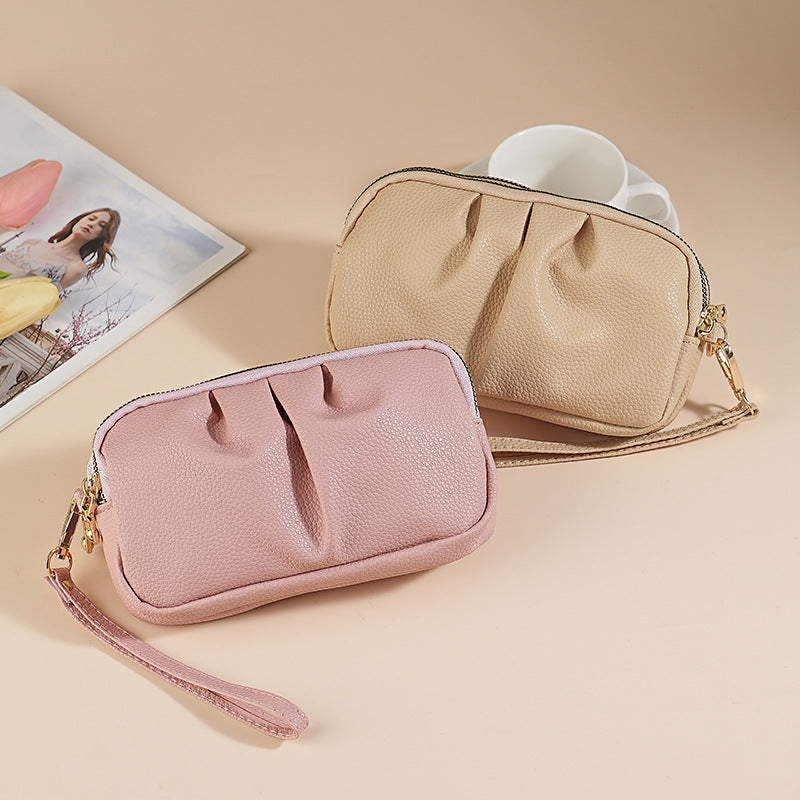 Texturierte Reißverschluss-Clutch Tasche