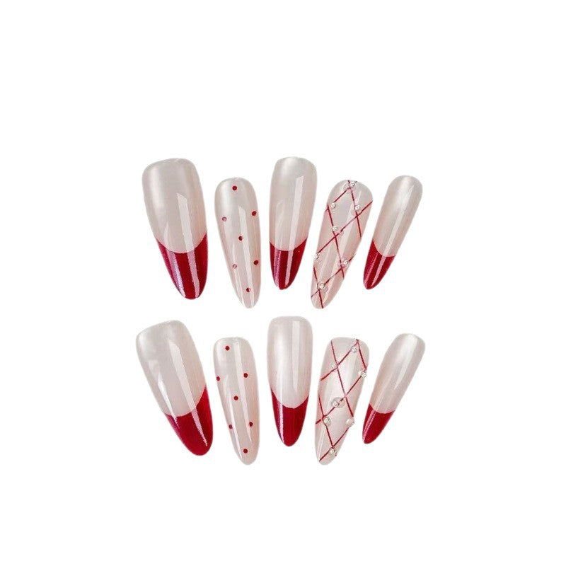 Elegante Kunstnagel-Set mit stilvollen roten Akzenten Karnz