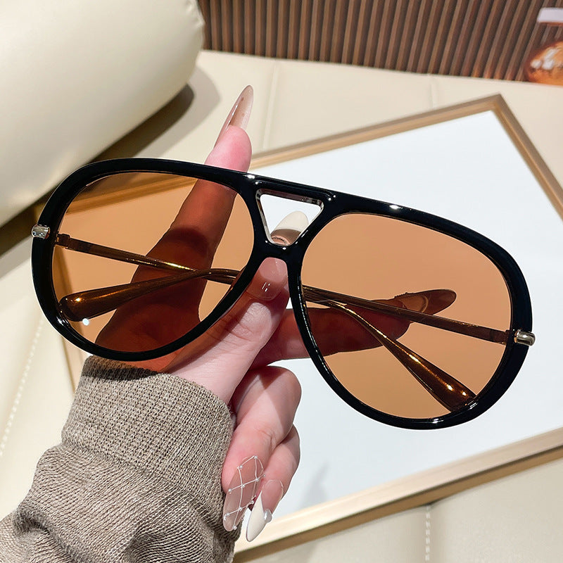 Damen Sonnenbrille im extravagantem Design mit markanten Gläsern Karnz