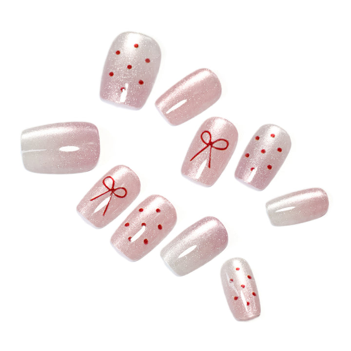 Künstliche Nagelkunst mit niedlichen Schleifen-Design Karnz
