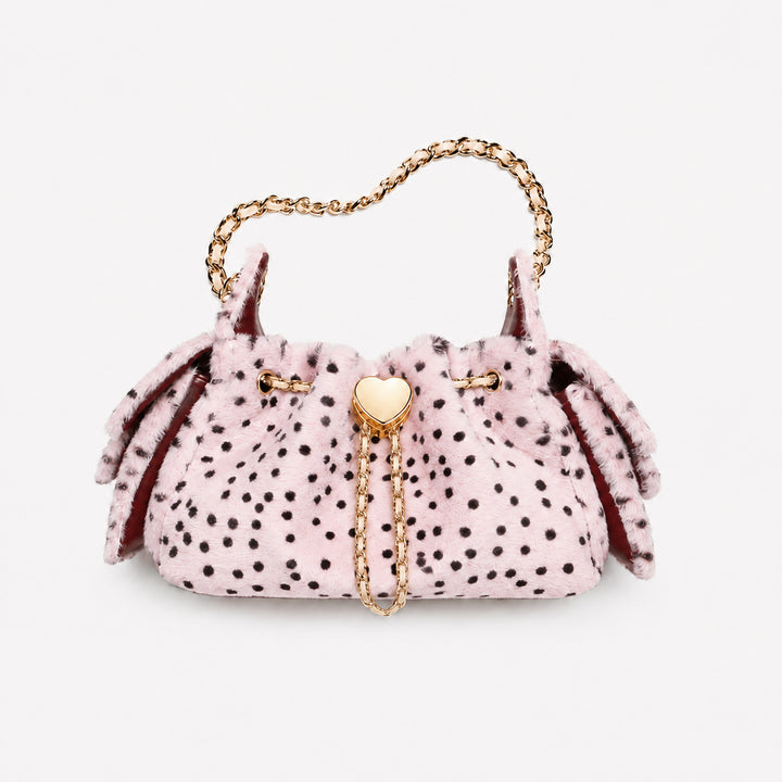 Verspielt gepunktete Handtasche