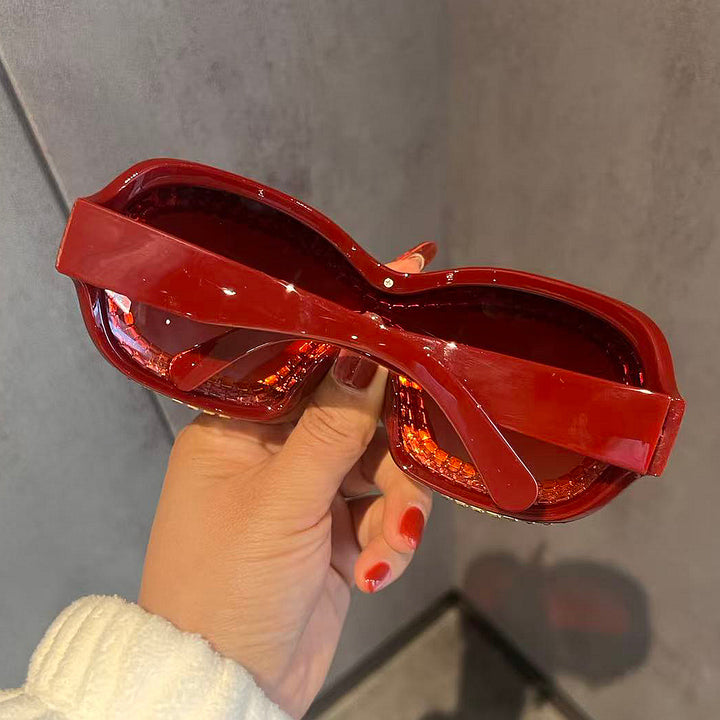 Damen Glamouröse Sportsonnenbrille mit extravagantem Kristallrahmen Karnz