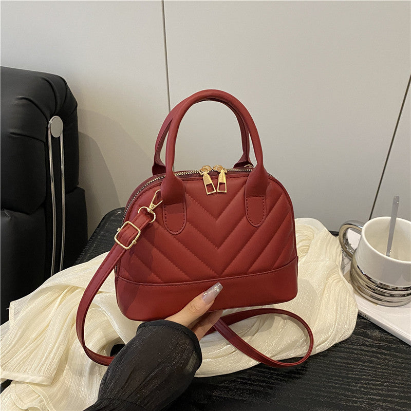 Gepatchte Mini-Handtasche Karnz