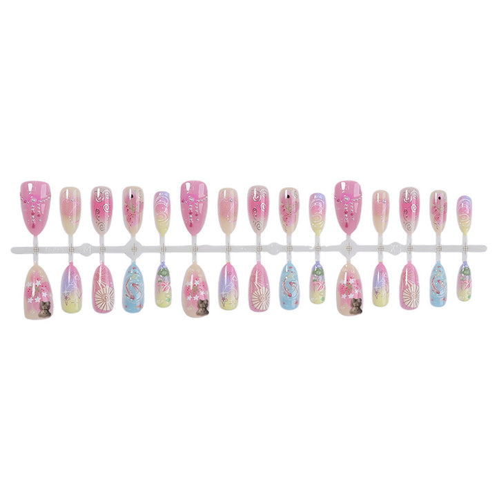 Künstlerisches Press-On-Nagelset mit floralen und grafischen Designs Karnz