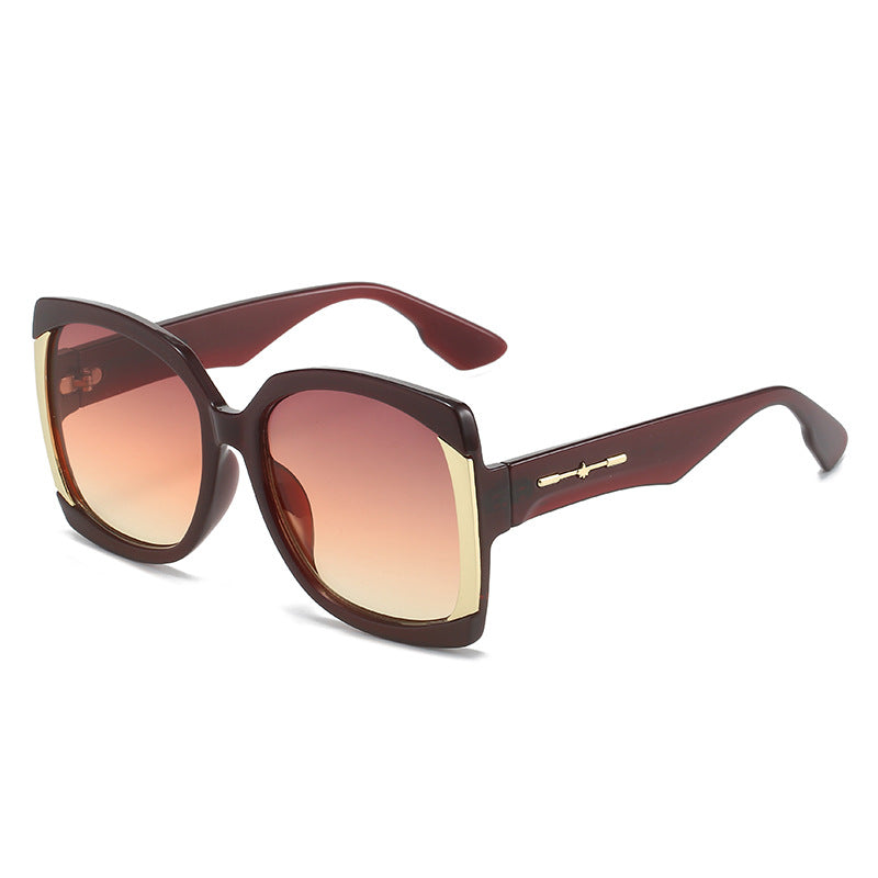 Übergroße Schildpatt-Sonnenbrille mit goldenen Akzenten Karnz