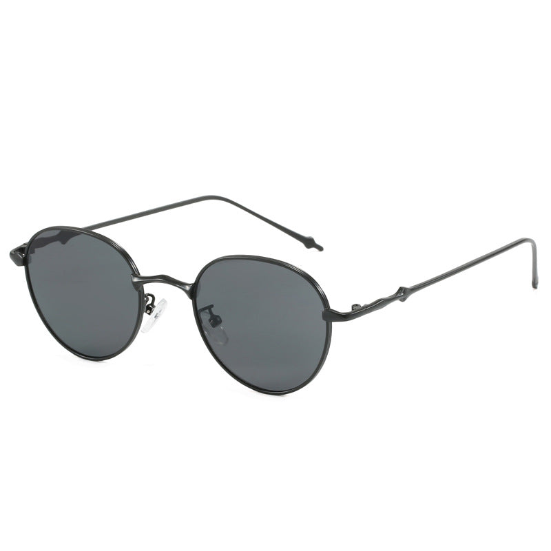 Damen elegante runde Sonnenbrille mit modischem Metallrahmen Karnz