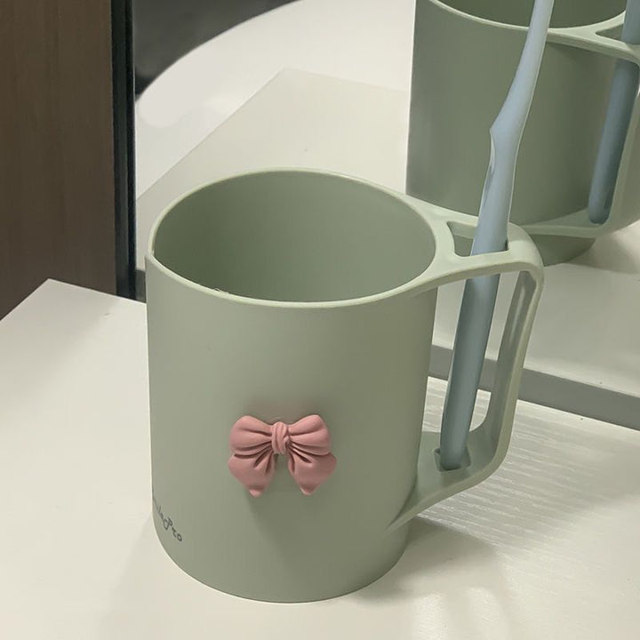 Keramiktasse mit Elegantem Schleifenmotiv Karnz