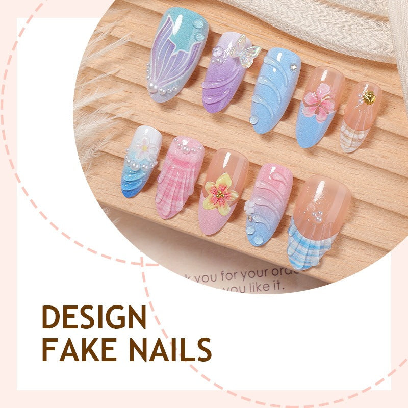Kunstnagelset mit eleganten floralen Akzenten und kreativen Designs Karnz