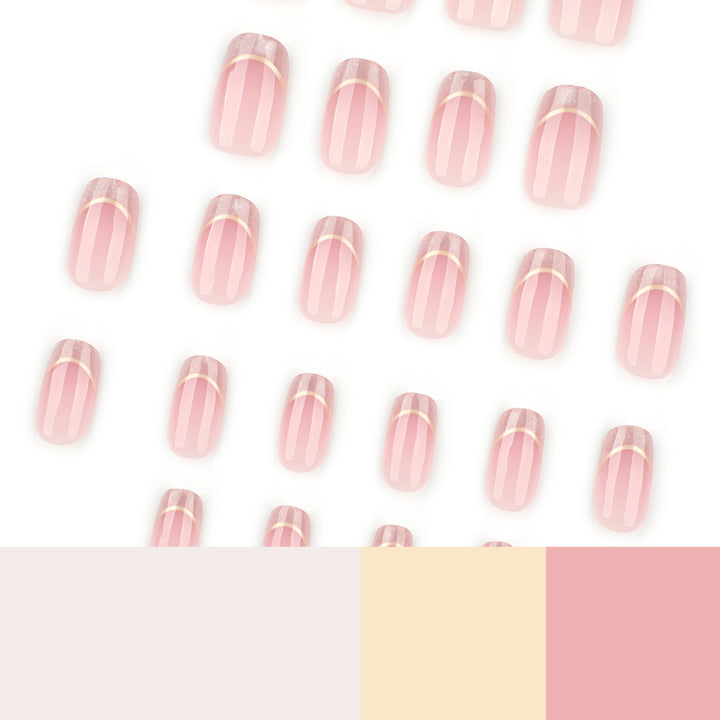 Kunstvolle Nagelverlängerungen mit Glitzer- und Golddetails Karnz