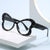 Damen verspielte Herz-Sonnenbrille mit Glitzerakzenten Karnz