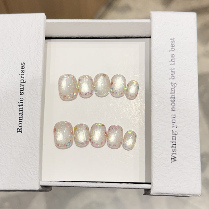 Kunstnagelset mit Romantischem Glitzereffekt Karnz