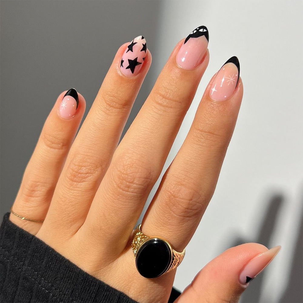 Künstliche Nagelkunst mit verspielten Punkten und Schleifen Karnz
