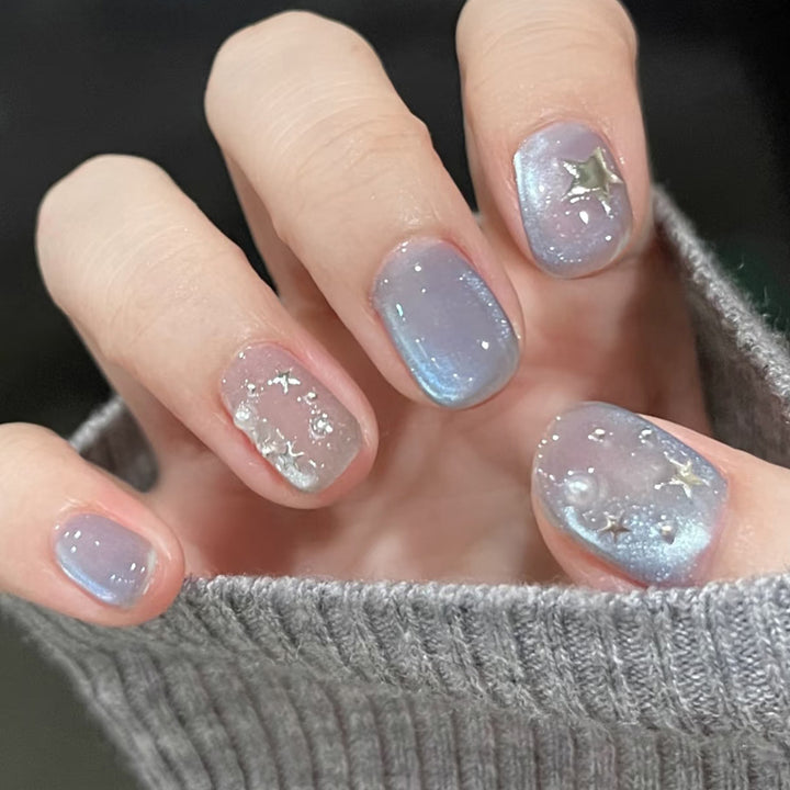 Künstlerisches Press-On Nagelset mit himmlischem Thema Karnz