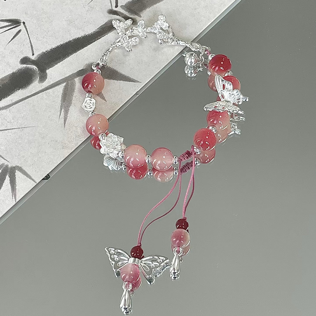 Handgefertigtes florales Schmetterlings-Charm-Armband Karnz