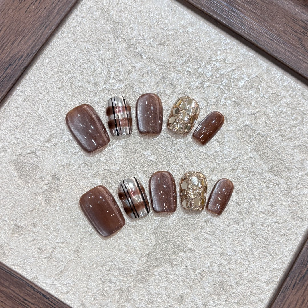 Kunstnägel-Set mit Glitzer- und Goldakzenten Karnz