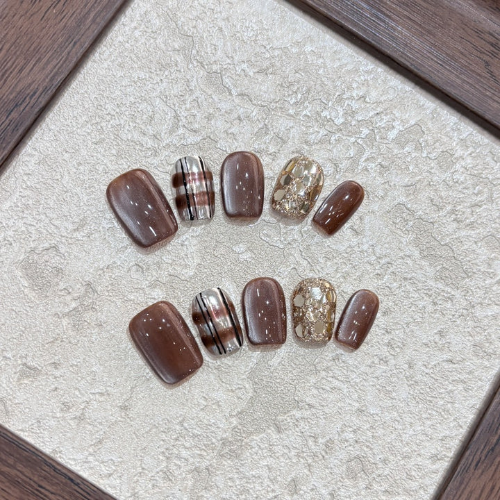 Kunstnägel-Set mit Glitzer- und Goldakzenten Karnz