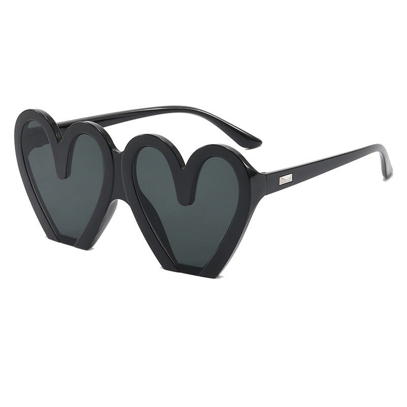 Damen Herzförmige Sonnenbrille mit auffälligem Design Karnz